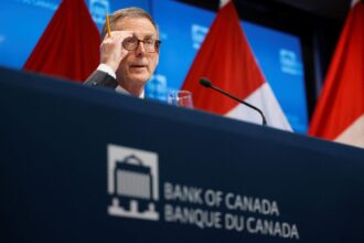 Currency and bond markets suggest investors have priced in a rate cut by the Bank of Canada next month in a string of moves. Central bank Gov. Tiff Macklem pictured above at a news conference after July’s rate cut. Photo: blair gable/Reuters