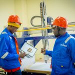 Students working in a university innovation hub supported by UNDP and Africell in West Africa