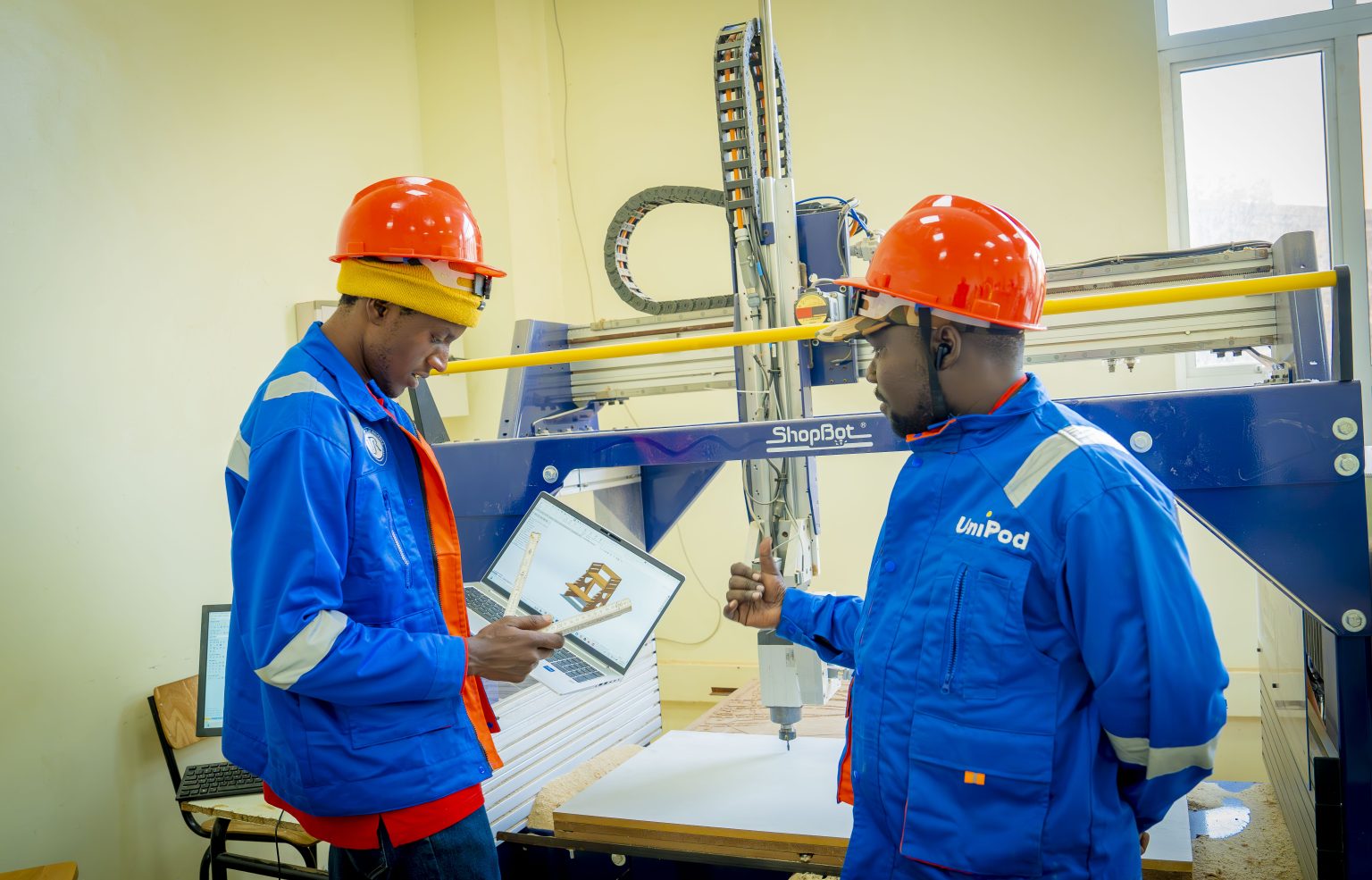 Students working in a university innovation hub supported by UNDP and Africell in West Africa