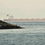 Major shipping lines suspend operations through the Strait of Hormuz following US and Israel strikes on Iran, disrupting oil and container trade.